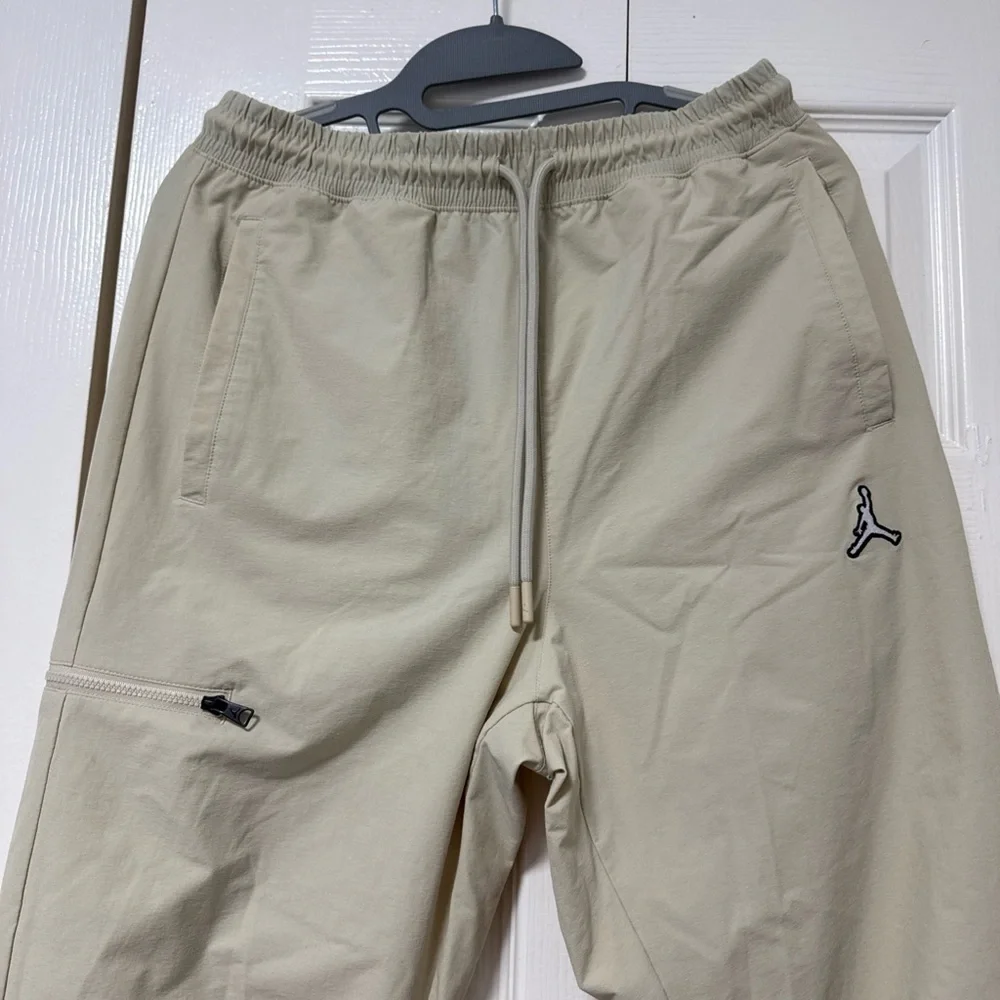 Jordan Men's Joggers in Beige with Black Jumpman A-11